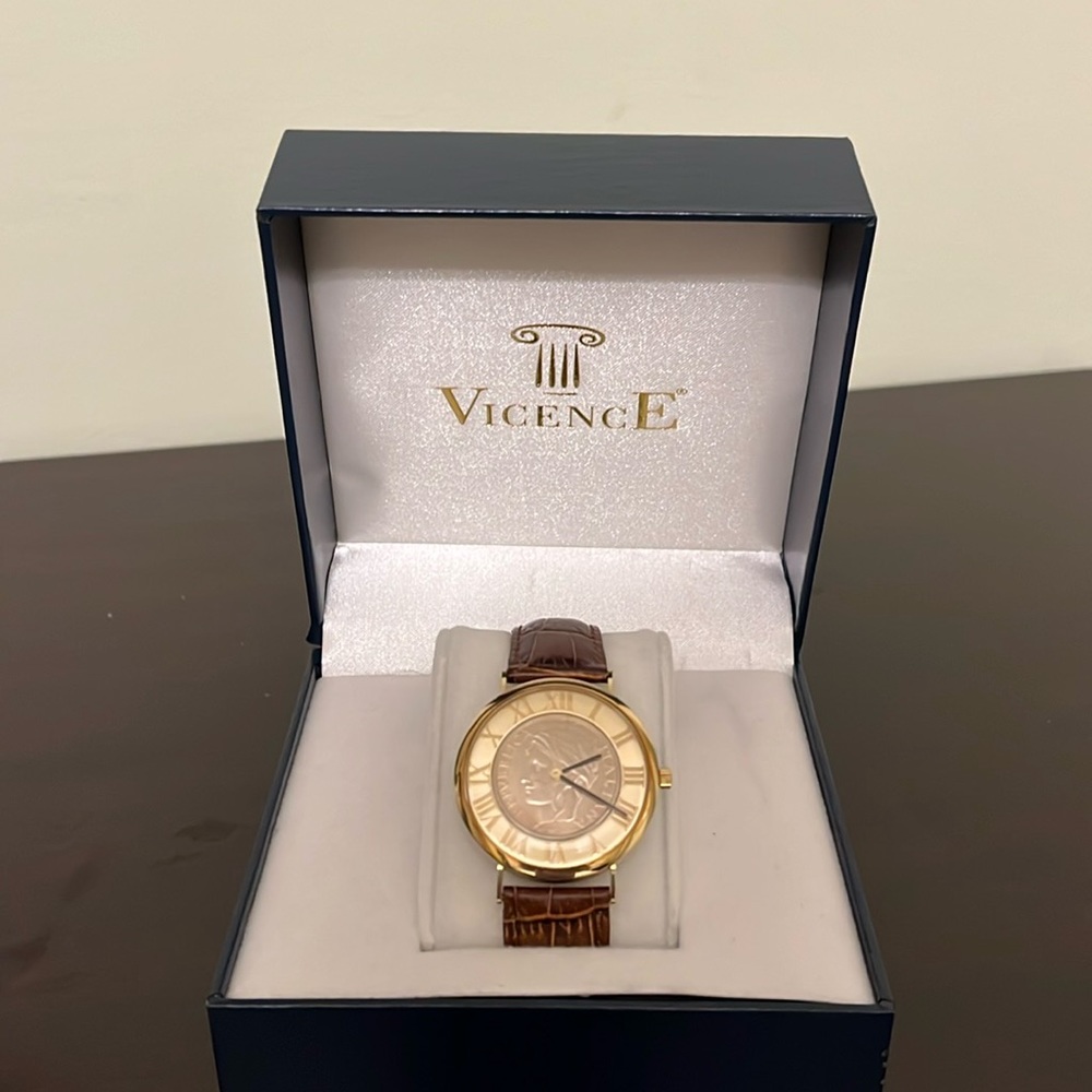 Vicence 100 Lire coin watch, 14k gold